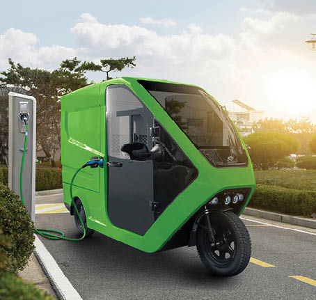 Concept of delivery electric tricycle scooter with charging station on city street